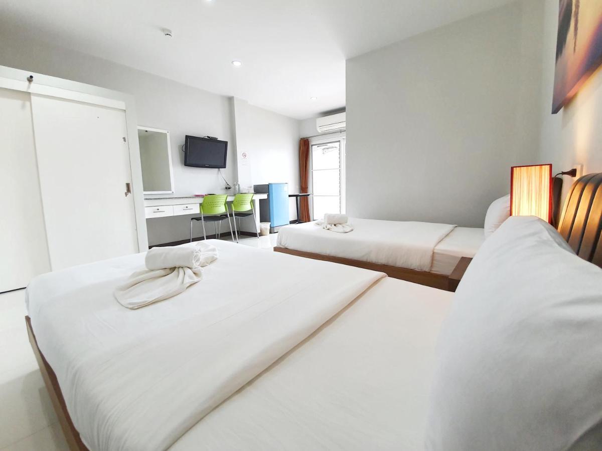 Orchid Surin Apartment Bagian luar foto