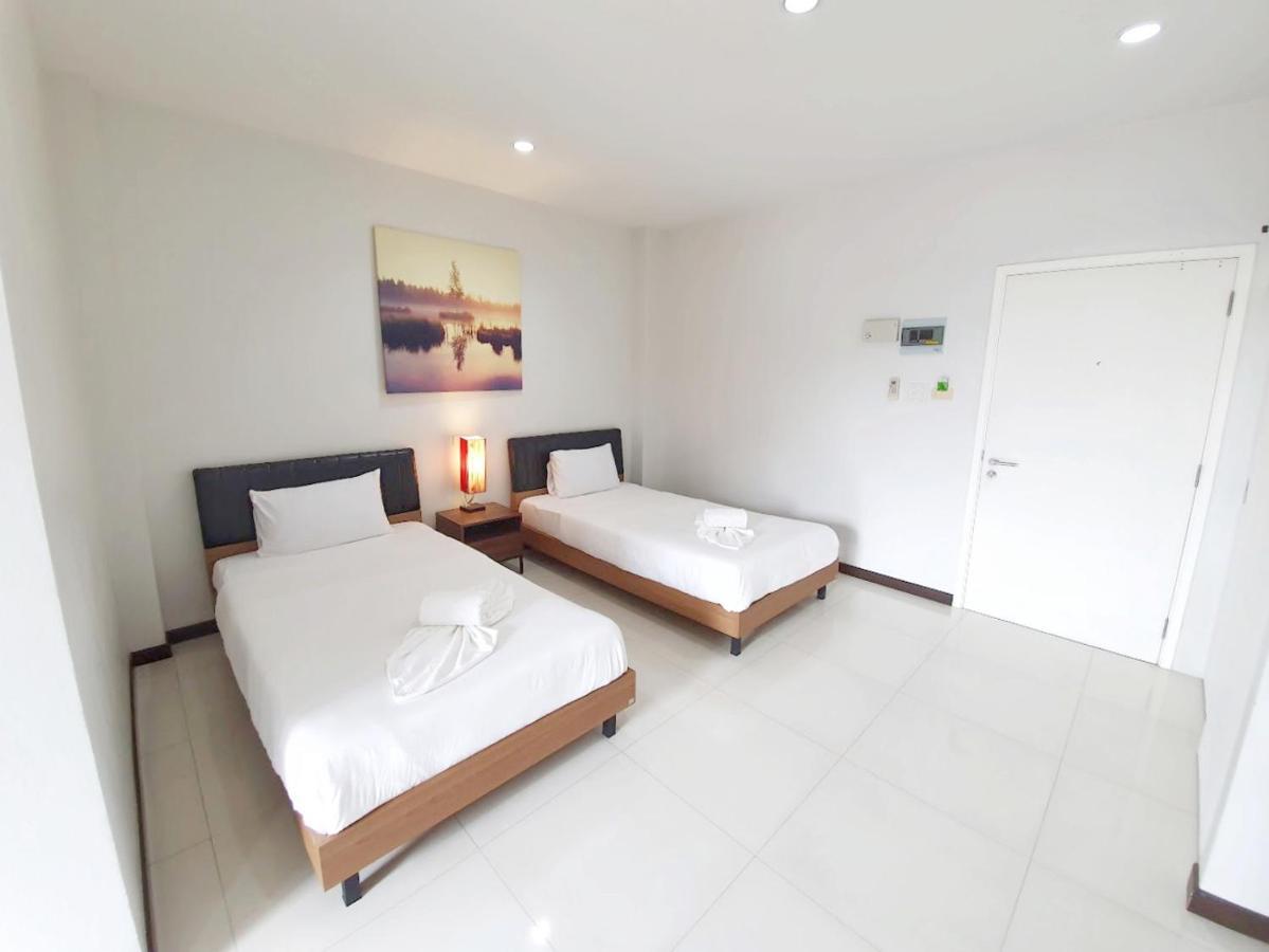 Orchid Surin Apartment Bagian luar foto